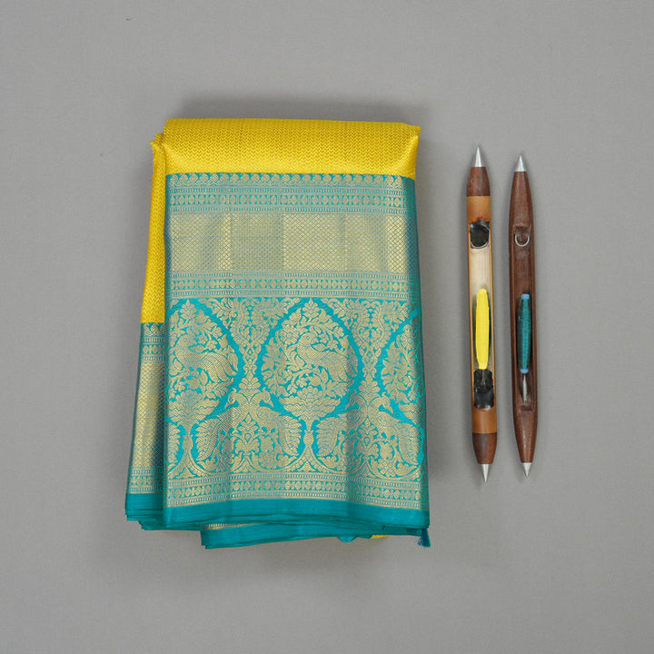 Hayagrivas Handwoven Korvai Kanjivaram Silk Saree in radiant Lemon Yellow with Peacock Blue contrast KBE1012I2-4
